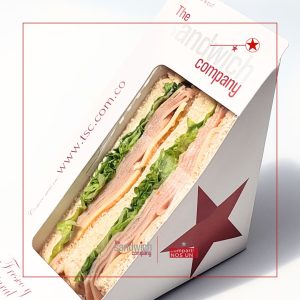 Sandwich de jamón y queso en empaque de cartón